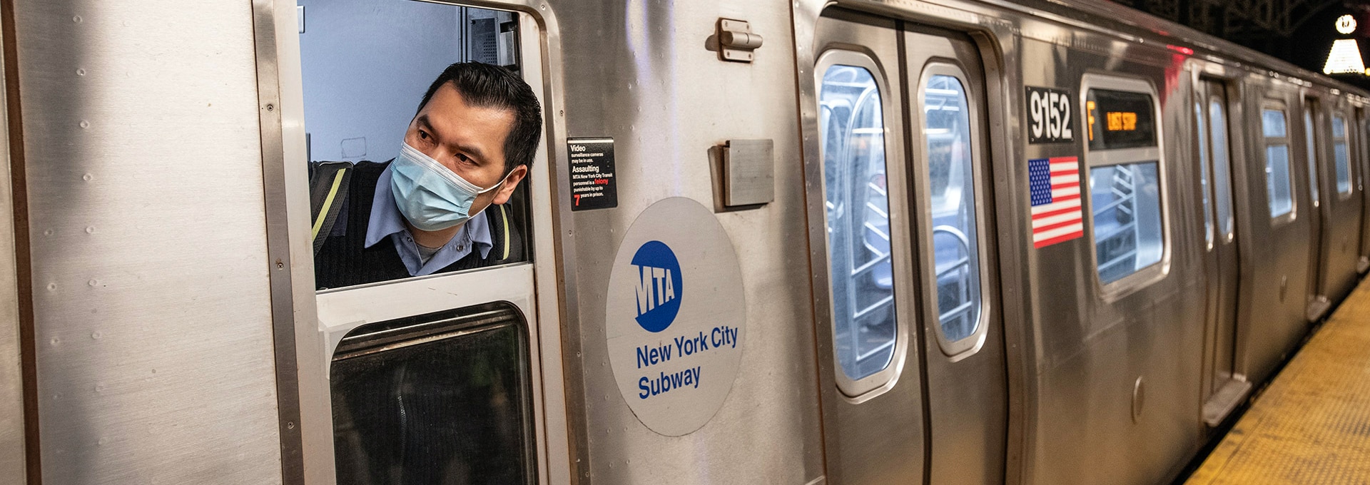 Subway train operator looking ahead