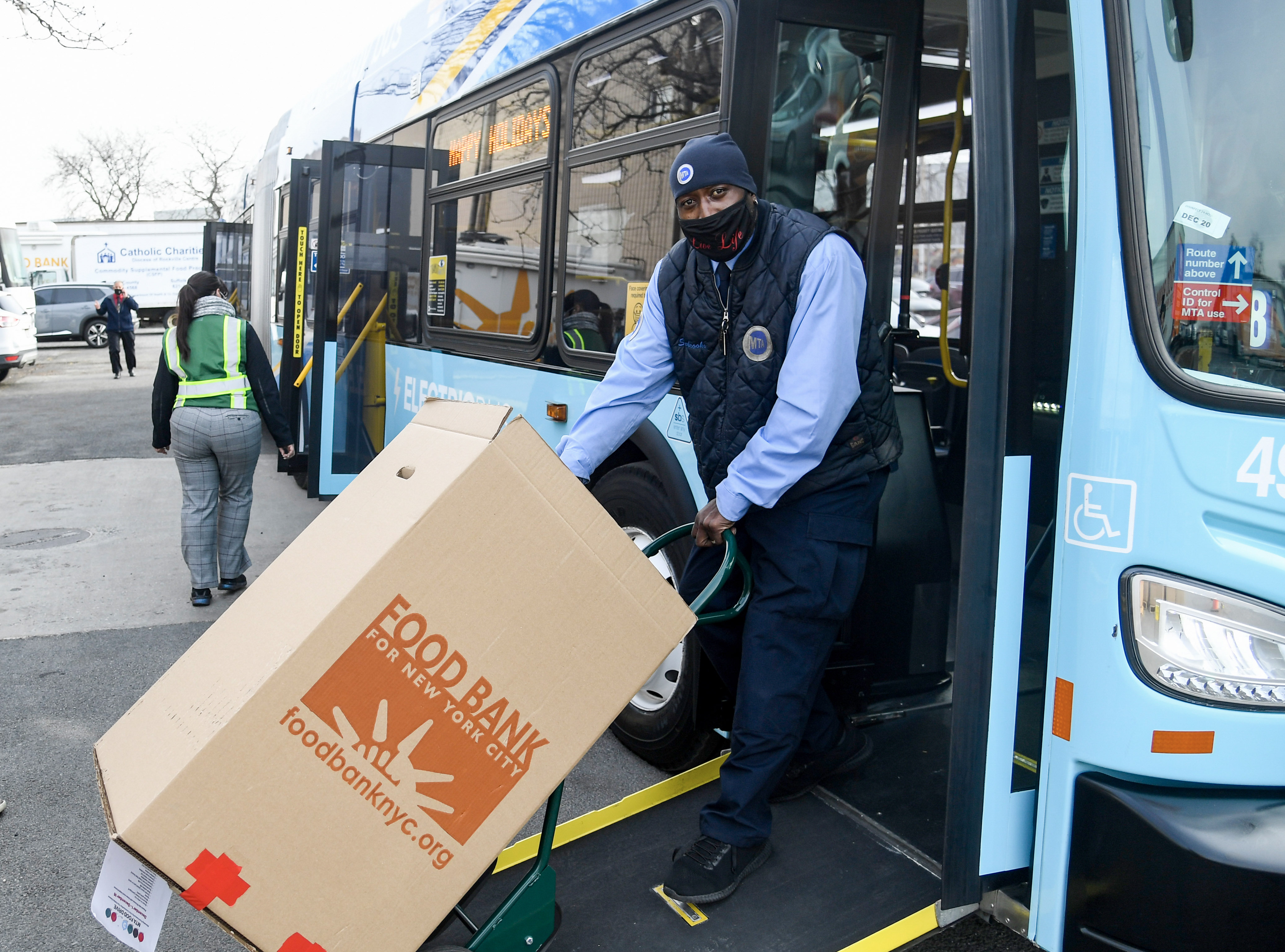 MTA delivers donated food to the Food Bank for New York City at the Hunts Point Cooperative Market on Tue., December 21, 2021. The food was collected through the “Stuff an Electric Bus” drive across MTA facilities. 