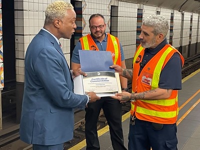 PHOTOS: MTA Presents Commendation to Hero Subway Cleaner  