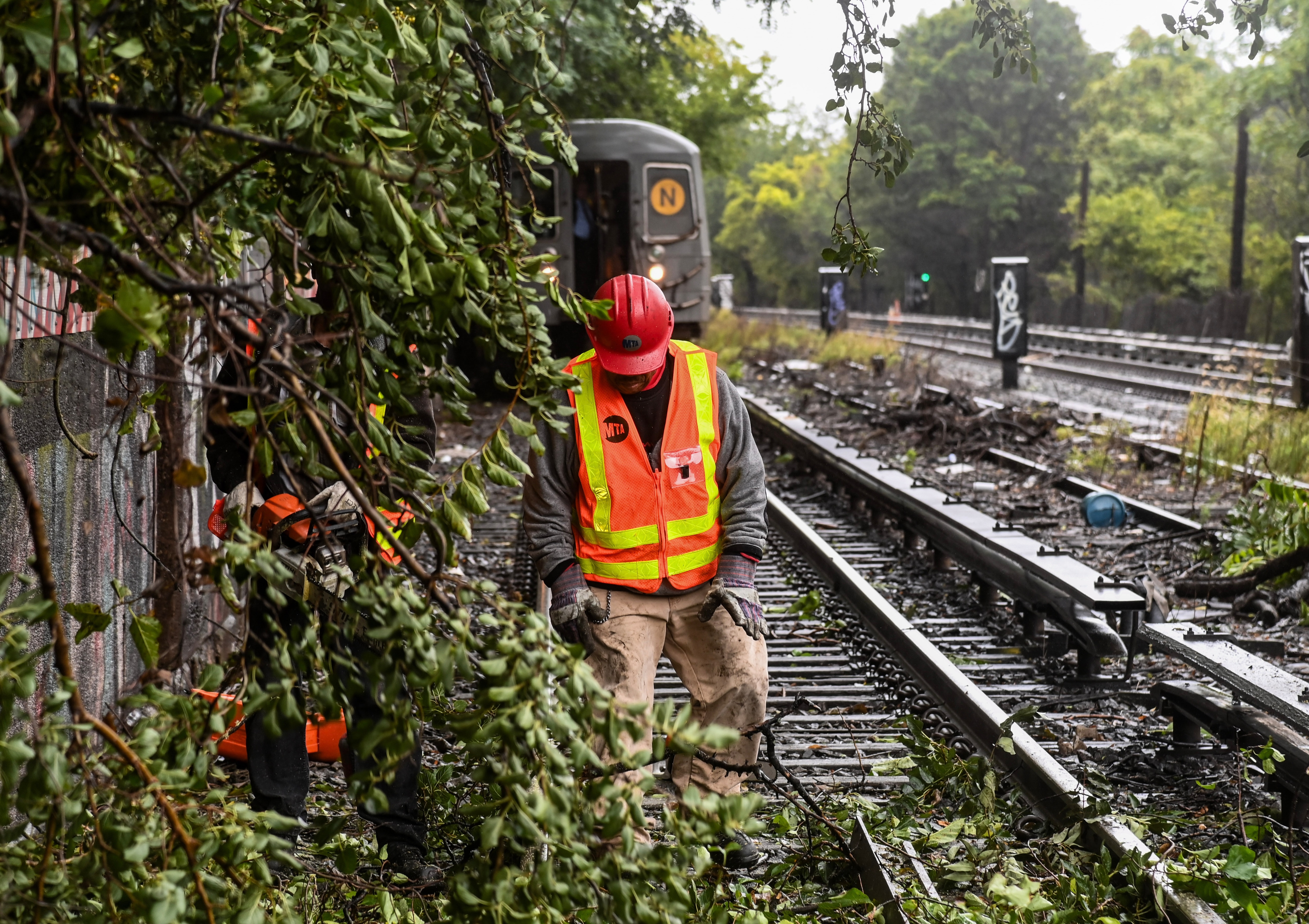 PHOTOS: MTA Crews Work to Remove Fallen Tree from Tracks in Brooklyn