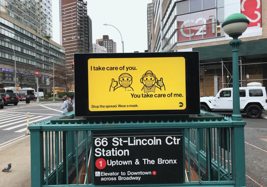 Photograph of digital ad playing at a subway entrance