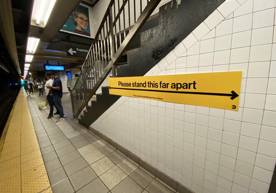 Photograph of a banner in a subway station