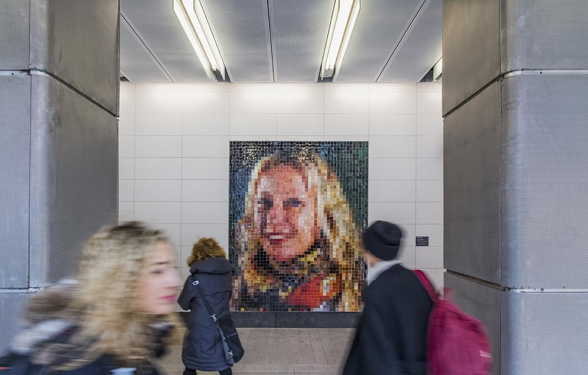 Mosaic by Chuck Close featuring a portrait of the artist Cindy Sherman. 
