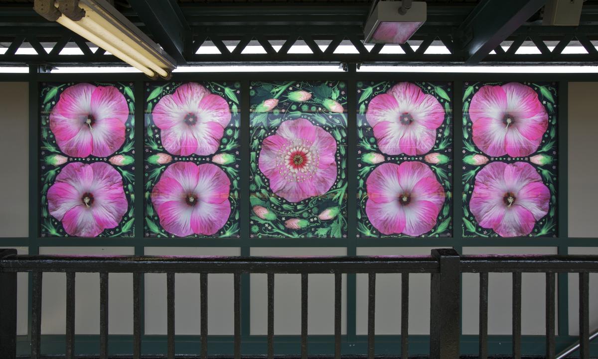 Artwork in laminated glass by Portia Munson showing colorful flower compositions. 