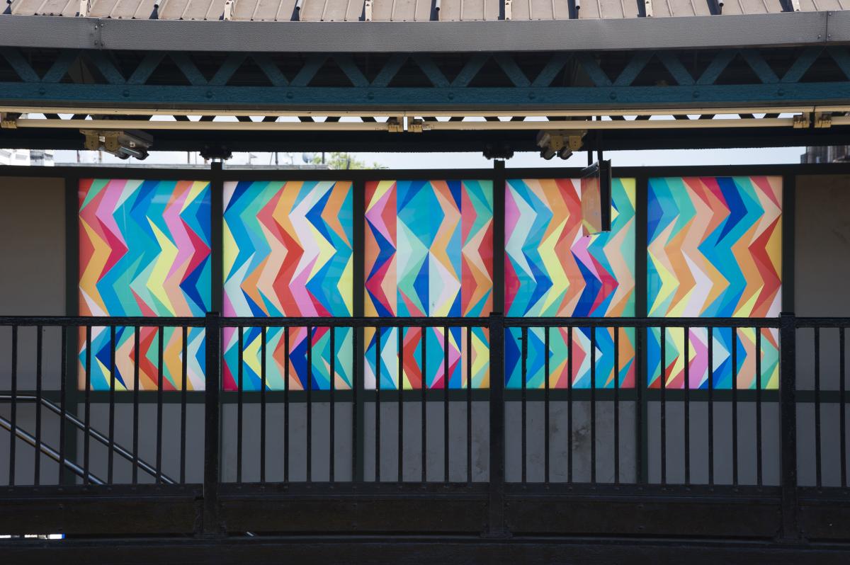 Artwork in laminated glass by Odili Donald Odita showing abstract color patterns. 