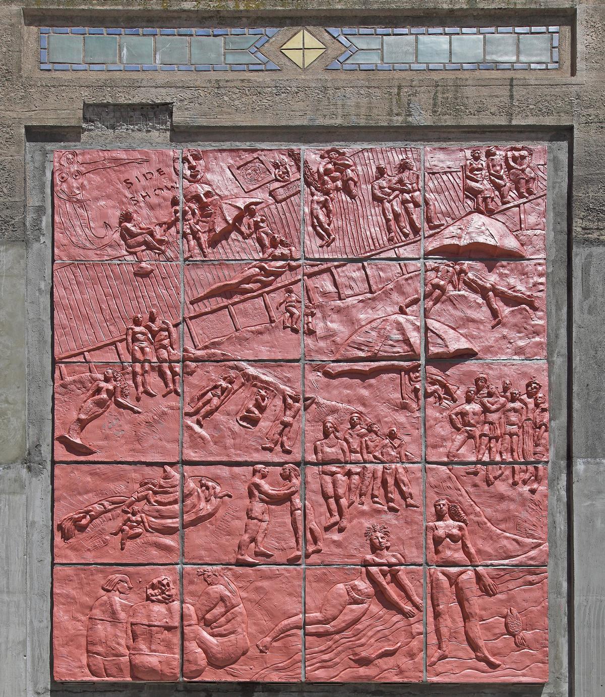 Artwork in terracotta colored cast concrete by Deborah Masters showing scenes from Coney Island.