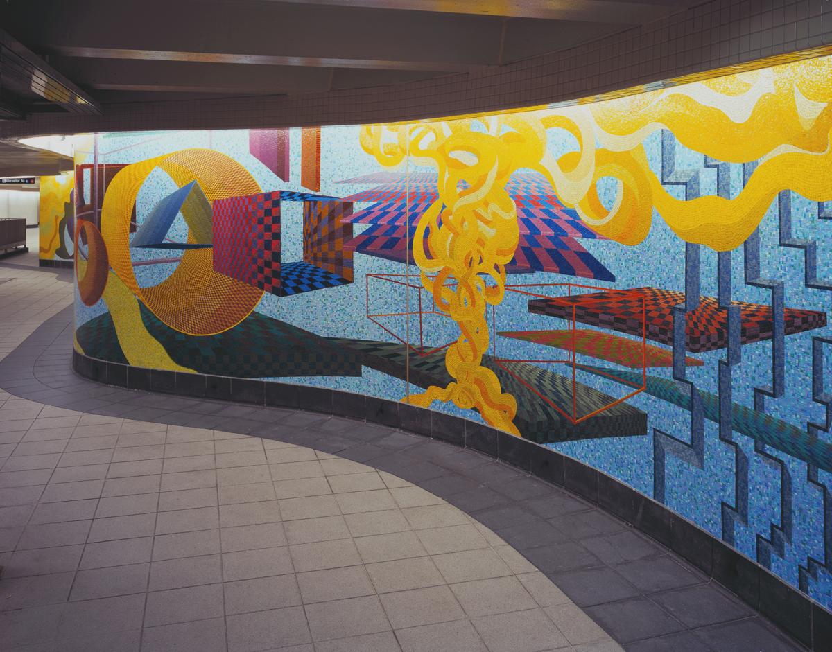 Artwork in glass mosaic by Al Held showing vast colorful murals with abstract geometric and fluid shapes floating and interacting. 