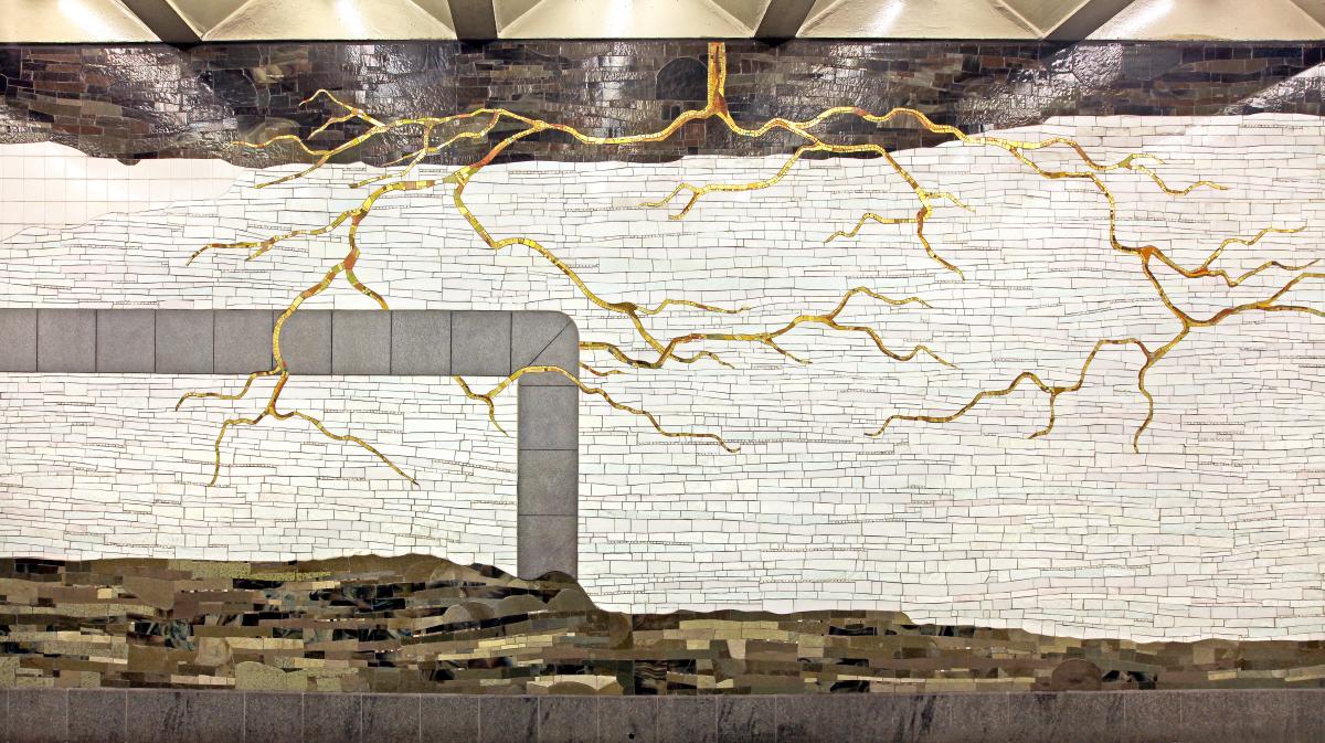 Artwork in glass, stone, and marble mosaic by Samm Kunce showing rock outcroppings, tree roots, pipes, animal burrows, and literary quotations. 