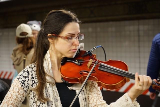 Woman playing violin.