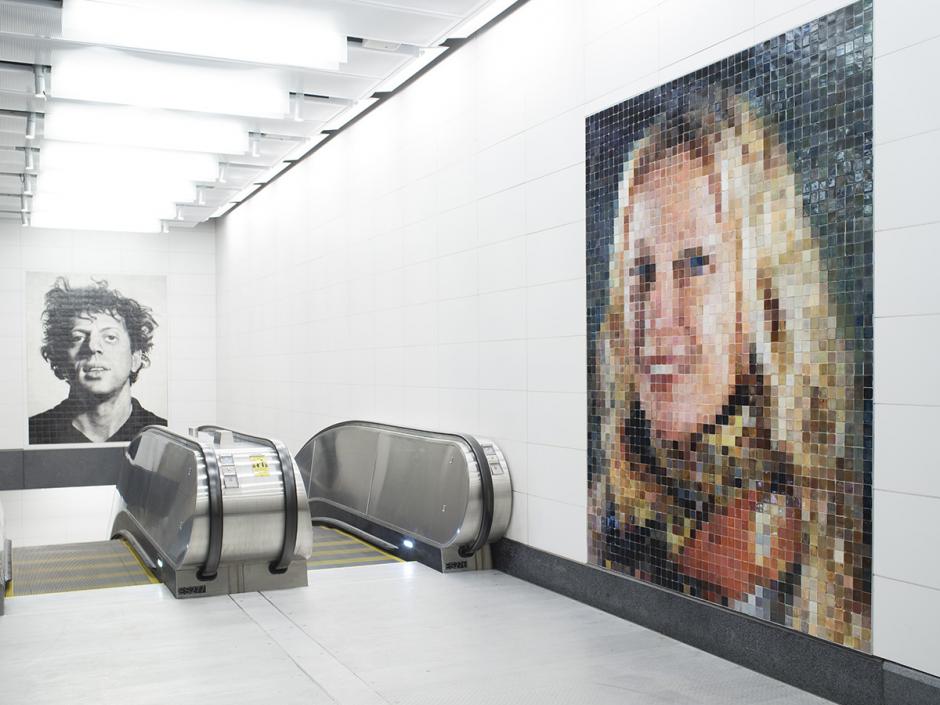 Mosaics by Chuck Close featuring a portrait of the composer Philip Glass and a portrait of the artist Cindy Sherman. 