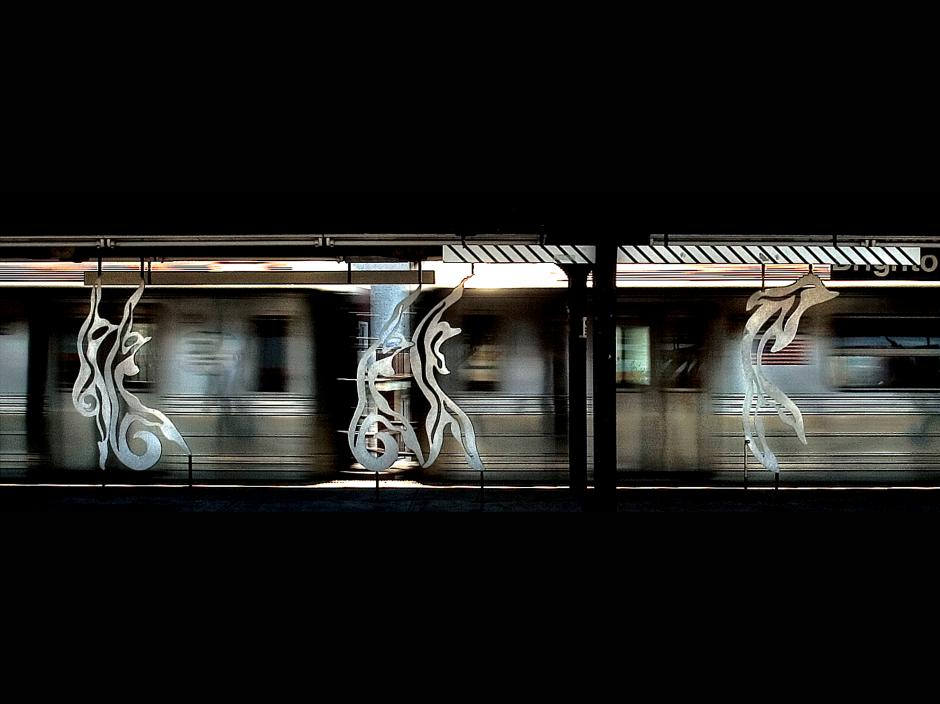 Artwork in metal by Dan George showing abstract dancers.