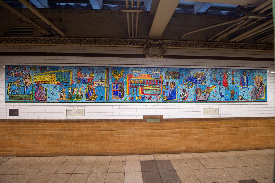 Artwork in glass mosaic by Willie Birch showing colorful depictions of figures on a blue background. 