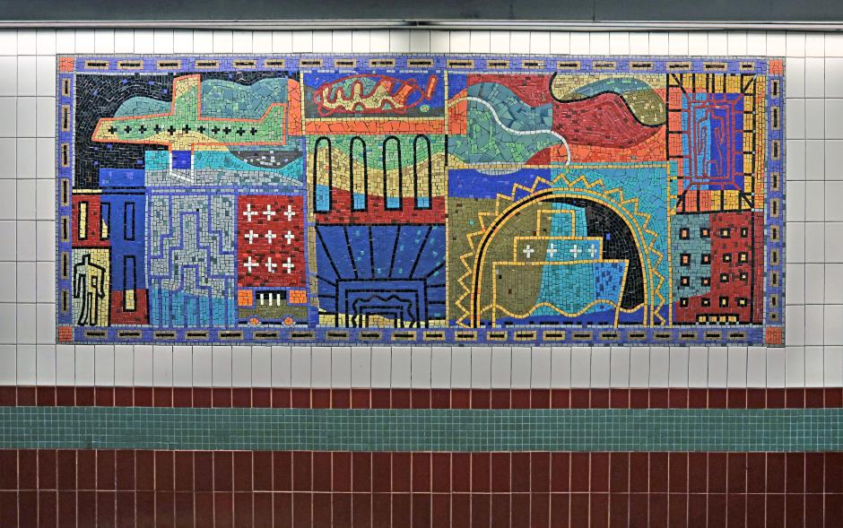 Artwork in mosaic by José Ortega showing bright colored shapes in abstract forms. 