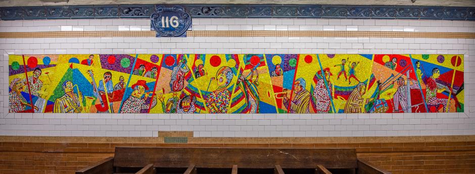 Artwork in glass mosaic by Vincent Smith showing colorful depictions of people and places in New York City.