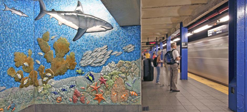 Artwork in glass and ceramic mosaic, handmade ceramic relief tiles, hand-cast glass, bronze and cut granite floor tiles throughout station by Arts for Transit Collaborative showing extinct and living animals, images from outer space to the earth's core and sea creatures.  
