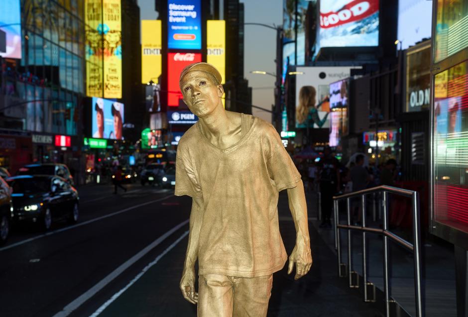 An image of the Times Square performer known as the "Da Gold Man."